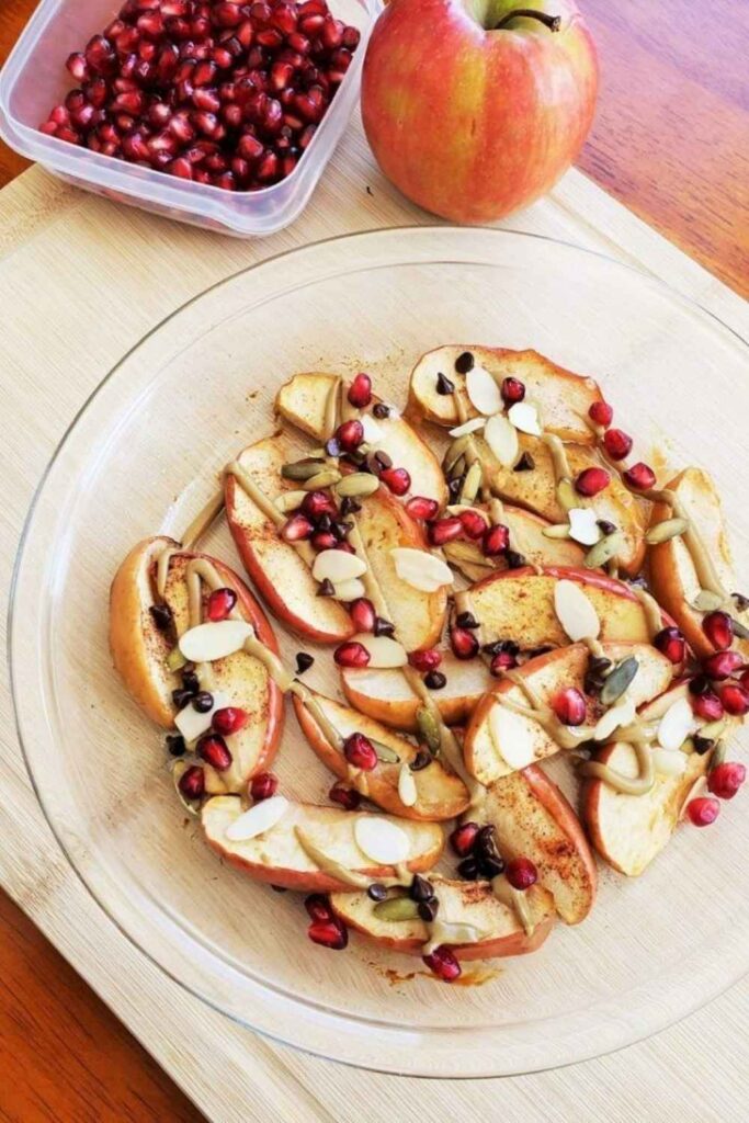 Apple Slices With Almond Butter and Hemp Seeds
