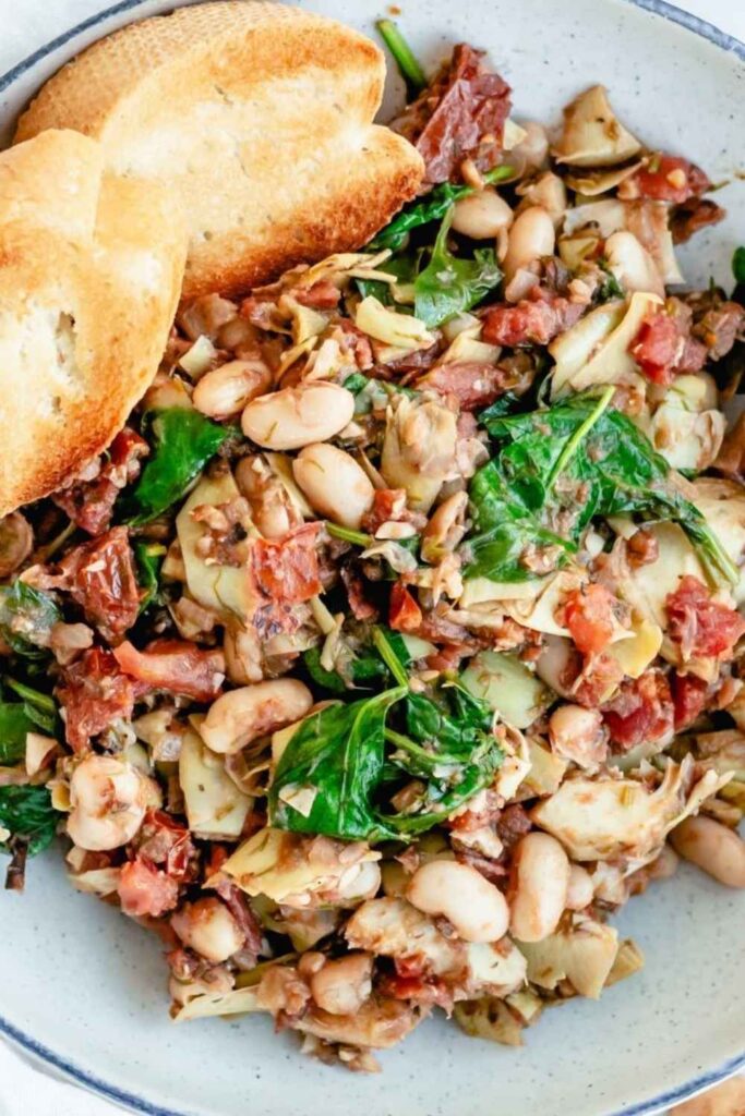 25 Easy Vegan Recipes That Actually Satisfy No Sad Salads Here 2 Creamy Tuscan White Bean Skillet