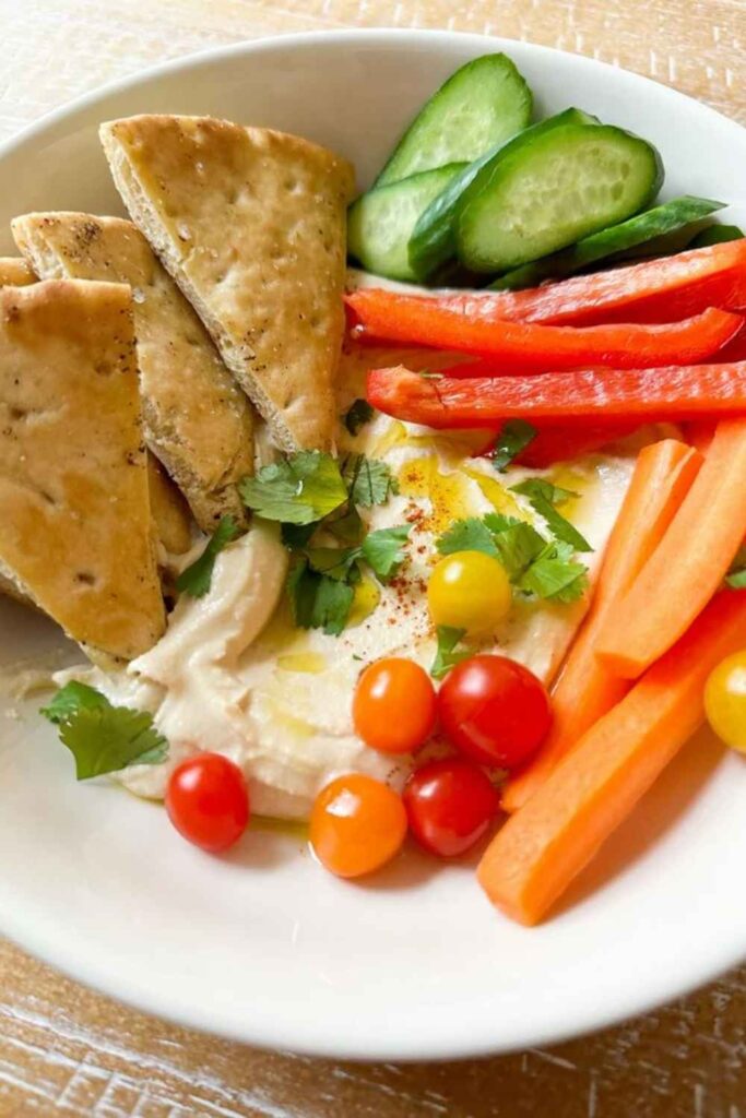 Hummus With Sliced Cucumber and Bell Pepper