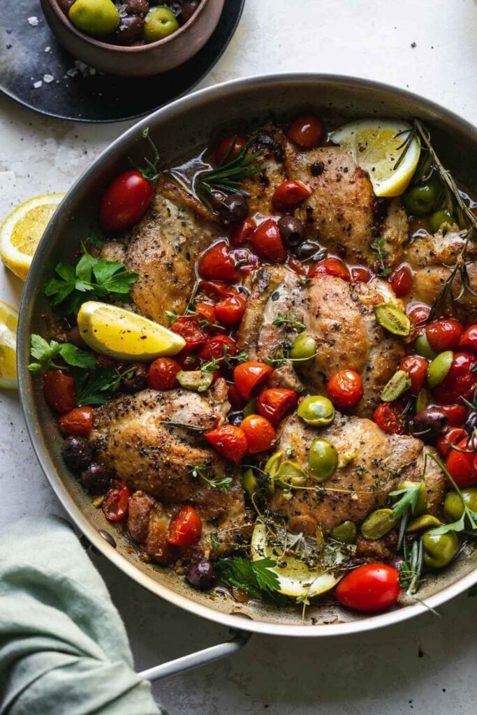 30 Easy Mediterranean Diet Recipes That Are Actually Worth Making in 2026 2 One-Pan Lemon Herb Chicken Thighs with Olives and Tomatoes