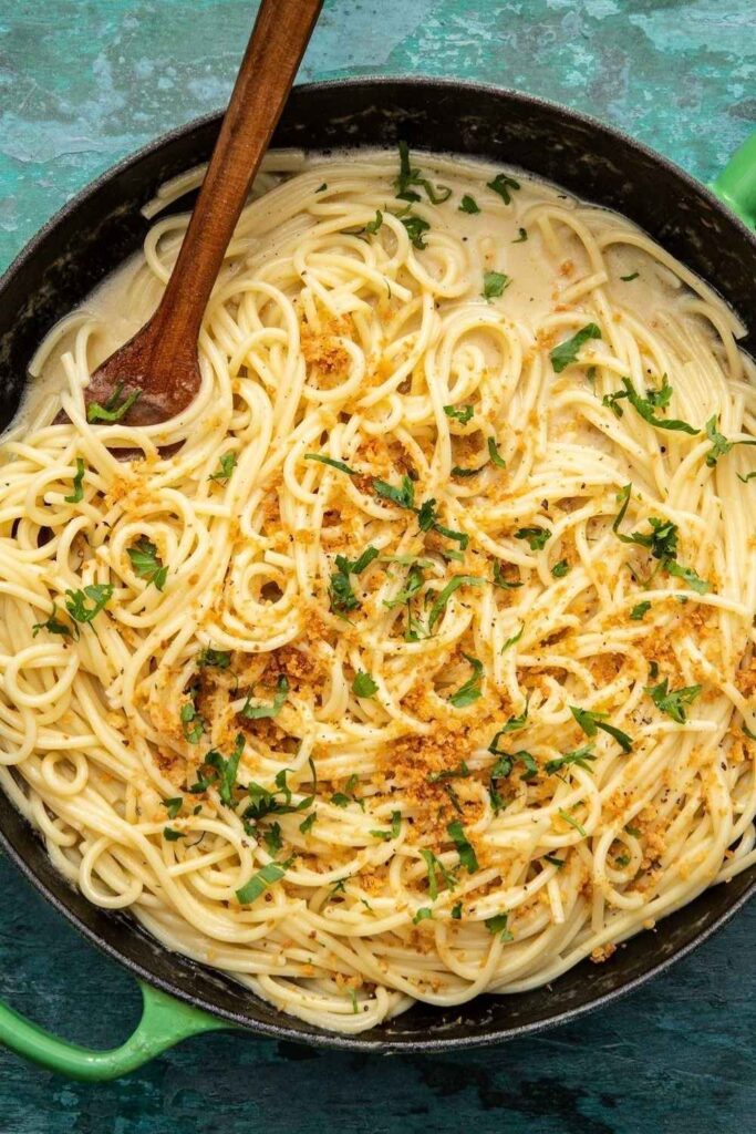 35 Kitchen Hacks & Cooking Tips That Actually Change How You Cook 2026 10 Pasta Water Is a Sauce Ingredient, Not Waste