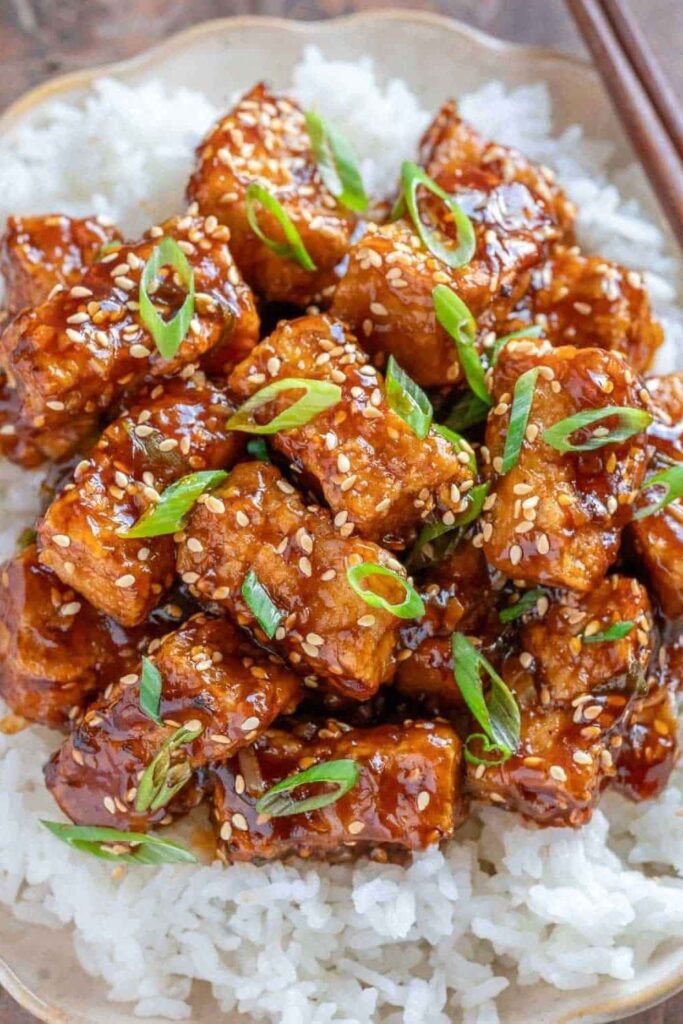25 Easy Vegan Recipes That Actually Satisfy No Sad Salads Here 5 Sticky Sesame Tofu With Garlic Rice